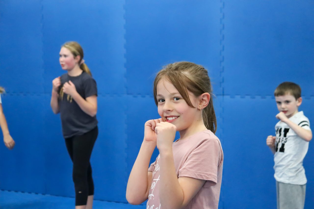 Young girl ready to punch